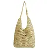 Bolso de paja tejida hecho a mano con diseño calado de gran capacidad para mujer, nuevo bolso de paja de estilo francés simple para vacaciones en la playa y uso en la playa