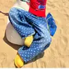 Diseño Retro Americano Lavado Estampado Completo Lunares Sueltos Pierna Ancha Jeans Cimitarra Unisex Casual Pantalones Largos Modernos