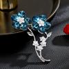Broche de flores fresco y artístico de alta gama con microincrustaciones de circonitas, traje de personalidad, alfiler exquisito, luz de lujo, gran sentido.