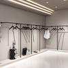 Estante de exhibición para tienda de ropa para mujer, estante simple de hierro negro para pared, percha especial, estante de exhibición de ropa para tienda de ropa