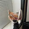 Bolso de axila de moda con flores bordadas de lentejuelas, gran capacidad, nuevo diseño floral bordado, bolso de hombro personalizado estilo chino 2026 para mujer