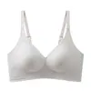 Sutiã de sustentação e levantamento sem costura cor nude com bojo fixo para seios pequenos, push-up, anti-flacidez, suporte macio, que acomoda os seios, sem aro de metal para mulheres
