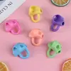 Ferramenta de pegada para caneta de prática de caligrafia infantil, corretor de pegada de lápis de silicone para três dedos para alunos do ensino fundamental corrigirem a postura de escrita