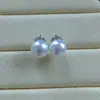 Fabricante de Zhuji Venta al por mayor Pendientes de botón de perla de agua dulce natural Pendientes estilo pestaña sin imperfecciones Forma redonda Brillo extremadamente alto Modernos Versátiles