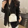 2025 Moda Elegante Ins Moda Simple Estilo Occidental para Mujer Textura Simple Cadena de Cerradura Bolso de Hombro Cruzado para Cena