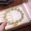 Dos pulseras Shihuan Fang de jade Hetian natural con cordón elástico Pulsera de loto pulsera de lujo ligero de alta calidad al por mayor