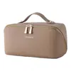 La nueva bolsa de maquillaje de PU de Amazon es una bolsa de almacenamiento de viaje portátil con compartimentos, bolsa de aseo impermeable y bolsa de maquillaje de mano