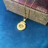 Bolsa de la suerte colgante palabra de pelo fortuna redondo collar de mujer accesorios de temperamento Joyería de Oro collar colgante venta al por mayor