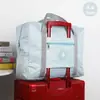 Bolsa de viaje para avión transfronteriza, color liso, bolsa tipo tote grande con logo redondo, bolsa de viaje plegable, bolsa de viaje para ropa, bolsa portátil