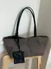 Yue Zi 2026 Verão Nova Moda Simples Grande Capacidade Tecido de Nylon Bolsa Versátil para o Dia a Dia Bolsa de Ombro Único Bolsa Tote
