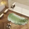 Alfombrilla de baño estilo ins transfronteriza con plantas verdes, alfombrilla de inodoro absorbente de agua, felpudo de forma irregular para uso doméstico, alfombra de tierra de diatomeas