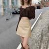 Saia sexy Spice Girl feminina outono cintura alta saia justa linha A saia de couro saia curta pequena saia quadril saia
