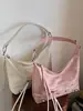 Bolso de axila de gran capacidad estilo coreano para mujer, bolso de trabajo, nuevo modelo primavera 2026, bolso tipo cubo biker con tachuelas, bolso cruzado