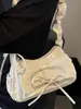 Bolsa de Ombro Plissada para o Trabalho Feminina 2026 Nova Moda Bolsa Transversal com Laço Bolsa de Mão de Alto Valor