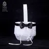 Suministros para bodas estilo occidental lazo blanco y negro cojín para anillos de novia anillo cojín pequeño fabricantes de suministros para bodas venta al por mayor personalizada