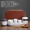 Juego de té de cerámica de porcelana blanca para exteriores, traje de viaje, bandeja de té al por mayor, portátil, jade sebo, taza rápida, regalos de empresa personalizados