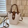Bolso cruzado coreano de nicho transfronterizo, nuevo bolso tipo cubo vintage, bolso de mano, bolso de hombro versátil y moderno para el día a día y para ir al trabajo
