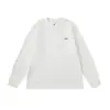 Camiseta de manga larga para hombre, estilo retro japonés, cuello redondo, color liso, logo bordado, texturizada, versátil, nuevo modelo primavera y otoño 2026, capa base