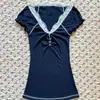 Top corto sexy y elegante con escote en V de encaje al por mayor 2026 camiseta de manga corta para mujer color azul marino de verano