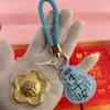 Llavero "Yiqianhua", correa para teléfono, colgante, decoración para bolso, artículos promocionales prácticos para transmisiones en vivo, pequeños regalos para vendedores ambulantes, venta al por mayor de fábrica