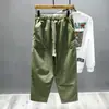 Marca de moda de otoño e invierno Pantalones casuales pesados americanos Pantalones tipo harén para hombre Cintura elástica Calle alta Sueltos Rectos Pantalones casuales para hombre