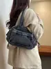 Bolsa Jeans Transfronteiriça para o Dia a Dia Feminina 2026 Novo Estilo Moda Grande Capacidade Nicho Simples Versátil Ombro Único Bolsa de Axila