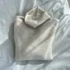 Suéter de punto versátil estilo dopamina con cuello alto para mujer, otoño/invierno 2026, cuello superpuesto, top de manga larga básico