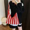 Bolsa Tote Color Block Listrada Oca de Nicho Estilo Coreano 2026 Verão Nova Grande Capacidade Conjunto de Bolsas de Ombro Femininas para o Dia a Dia
