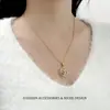 Pendientes de botón ovalados con incrustaciones de circonita bañados en oro estilo vintage, pendientes de perla con elegancia francesa, pendientes versátiles de lujo de alta gama