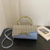 Bolso versátil de moda de nicho para hombro y bandolera, nuevo bolso cruzado al por mayor para mujer 2026, bolso tipo caja con bloques de color único, moderno