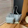 Bolsa de Cesta Tejida Estilo Francés 2026 Nueva Verano Piel Suave Bolsa de Viaje al Trabajo Hombro Único Bajo el Brazo Bolsa Tote