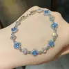 Pulseira Geométrico Redondo de Zircônia Dourada Café Luz Luxo para Mulheres Atmosfera de Alto Padrão Trevo de Quatro Folhas Pulseira de Celebridade da Internet Joia de Mão de Celebridade da Internet