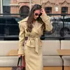 Moda europea y americana transfronteriza para mujer AliExpress INS superventas casual gabardina con cuello de solapa entallada a la cintura + conjunto de falda