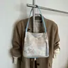 Bolso de diseño de nicho moderno y a la moda, bolso cruzado de cubo simple casual de primavera nuevo transfronterizo para mujer