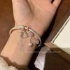Pulsera nueva con patrón de campana de gato dulce chino 2023 nueva joyería artística de nicho corazón de niña venta al por mayor