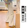 Calça de trabalho off-white com bordado de coração para mulheres, novo modelo verão 2025, cintura alta, solta, modeladora, secagem rápida, calça esportiva de perna larga