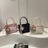 Bolso bandolera para mujer, elegante y chic, nuevo bolso cubo de moda retro, versátil para el trabajo