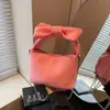 Bolsa Feminina de Design Criativo de Nicho Ins Bolsa de Mão com Laço de Verão Bolsa Pequena Simples de Tecido Oxford Fofa e Menina