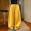 Pantalones deportivos de retazos con cordón y dobladillo curvo para mujer, nuevos pantalones de otoño de cintura alta de pierna ancha, holgados, adelgazantes, casuales, versátiles de pierna ancha