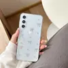 Funda Transparente Corazón de Pegamento para Teléfono Móvil Adecuada para Samsung S25Ultra Mariposa S24 Serpiente S23 Cereza A16 Modelo Nuevo Femenino