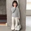 You Hua 2026 Otoño Nuevo Niñas Suave Pegajoso Versátil Color Sólido Simple Elegante Manga Larga Top Capa Base 68787