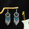 Brincos Étnicos Retrô Transfronteiriços Brincos Longos com Franjas Vermelhas Estilo Boêmio Brincos de Férias em Yunnan Estilo Exótico