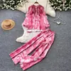 Elegante conjunto casual estampado de dos piezas para mujer, top de manga larga y pantalones de pierna ancha para otoño, atuendo versátil para ir al trabajo, nuevo modelo de otoño 2026