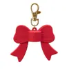 Llavero Personalizado con Logo Transfronterizo, Cubierta de Silicona con Forma de Ala para Tapa de Labial/Brillo de Labios, Tapa de Bálsamo Labial con Clip de Grado Alimenticio
