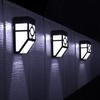 Lámpara de pared retro solar transfronteriza lámpara de panel solar iluminación exterior a prueba de lluvia lámpara de pared pequeña lámpara de rejilla lámpara de pared