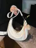 Bolsa de Dumpling Popular de Verano para Mujer 2025 Nueva Versátil Casual Bolso de Hombro Simple Color Puro Bolso Cruzado de Alta Gama