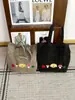 Bolsa de ombro em jeans lavado divertida e charmosa para outono e inverno, bolsa tote vintage com bordado de desenho animado desgastado, bolsa de tecido jovem e versátil