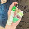 Jalea de Arena Líquida Infundida con Aceite Frijol de Gelatina Sanrio Taza de Té con Leche Llavero Colgante de Bolsa Acrílico Decoración de Llavero Pequeño Regalo