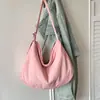 Bolsa de mão da moda e versátil em formato de bolinho para mulheres, nova coleção 2026, bolsa de ombro cruzado, bolsa de axila simples e estilosa, adequada para vendas transfronteiriças