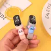 Pulseira de desenho animado de explosão quente de fábrica, relógio eletrônico de boneca LED, relógio de pulso à prova d'água com toque para meninos e meninas, atacado